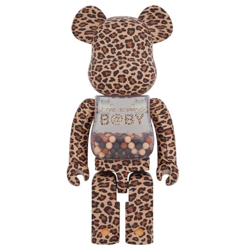 1000% Bearbrick My First Bearbrick Baby Leopard with leopard print and bead-filled transparent chest.
