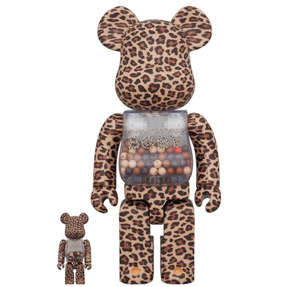 400% & 100% Bearbrick My First Bearbrick Baby Leopard with leopard print and bead-filled transparent chest.