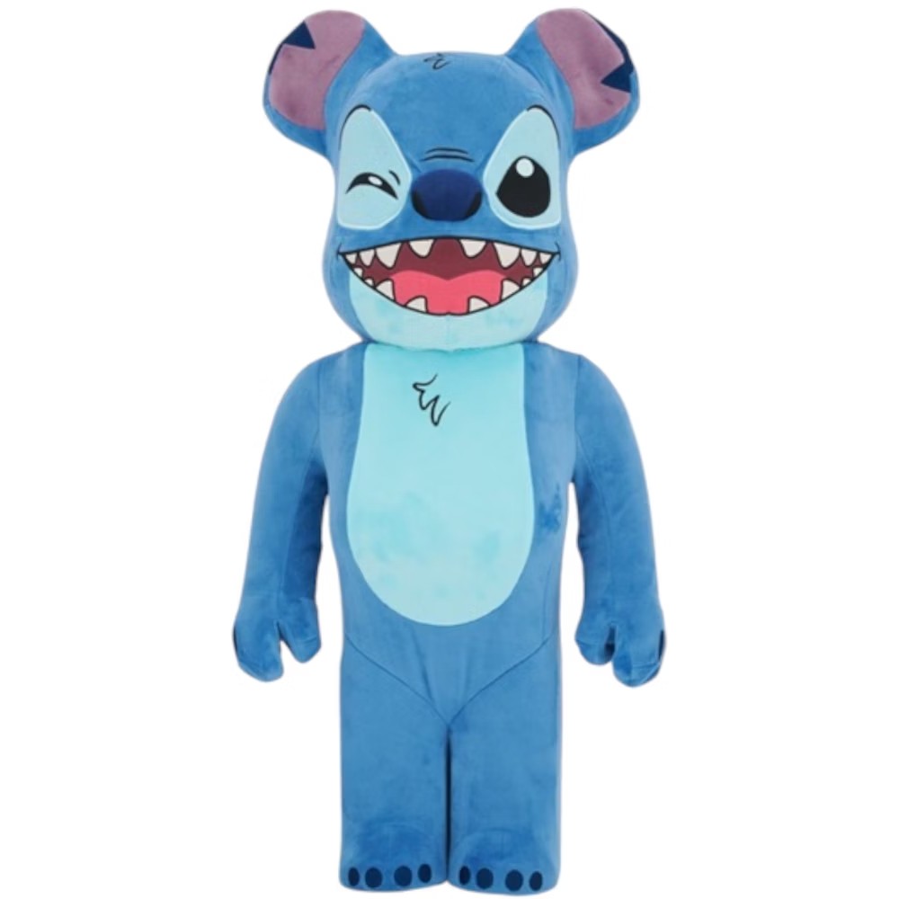 1000% Bearbrick Stitch Costume Version in plush blue with winking face, open mouth, and detailed Stitch features.