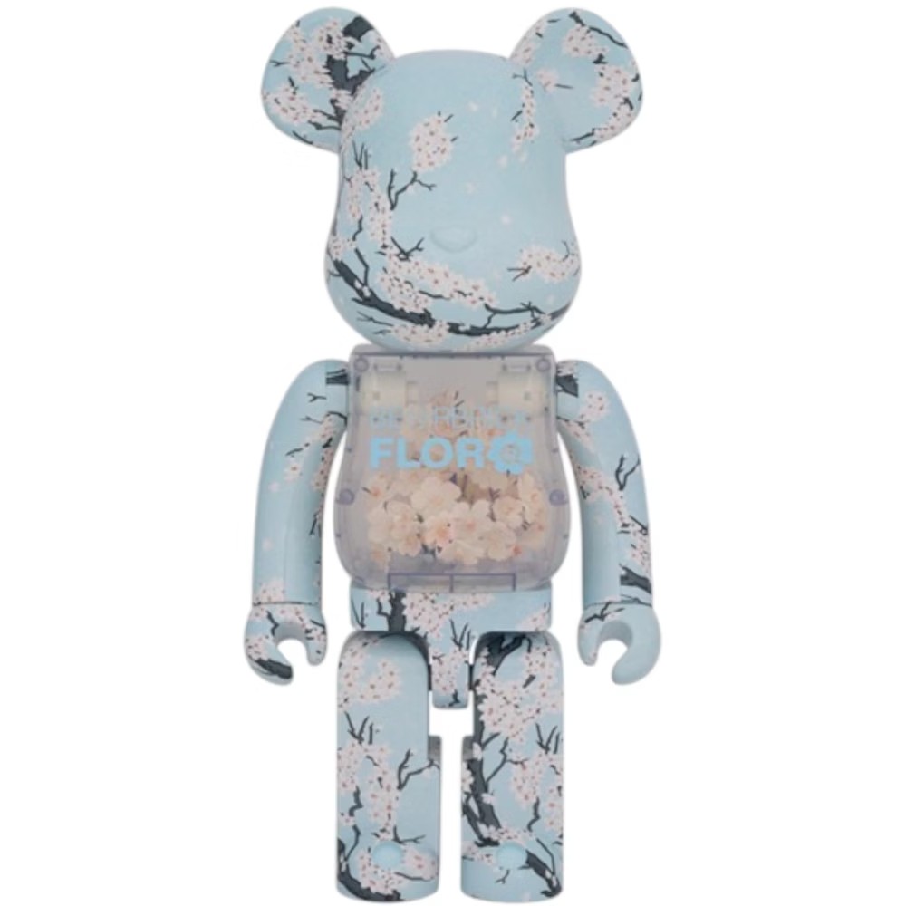 1000% Bearbrick Flora Sakura – oversized designer toy with cherry blossom floral print and transparent chest filled with faux petals