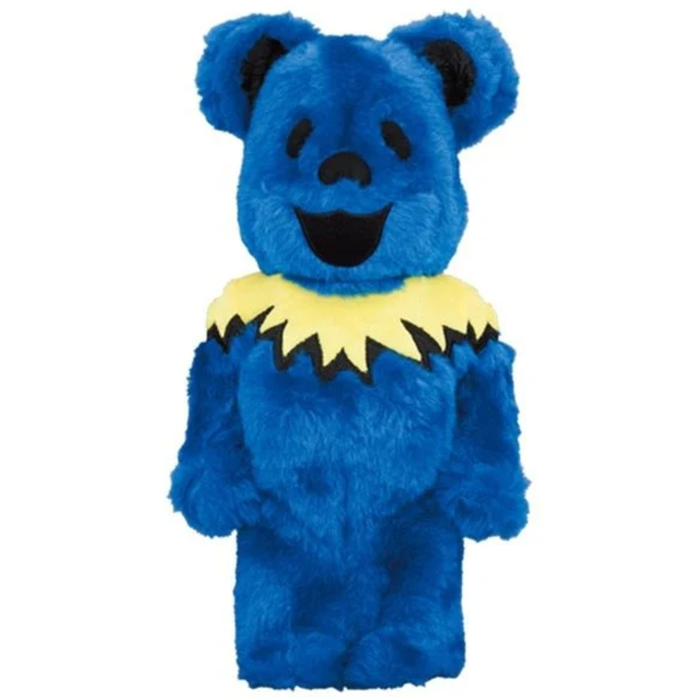1000% Bearbrick Grateful Dead Dancing Bears Blue edition with plush texture and yellow jagged collar detail.