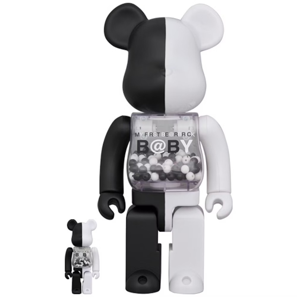 Front view of 400% & 100% Bearbrick My First Bearbrick Baby Black & White – monochrome design with clear chest compartment filled with black and white capsules