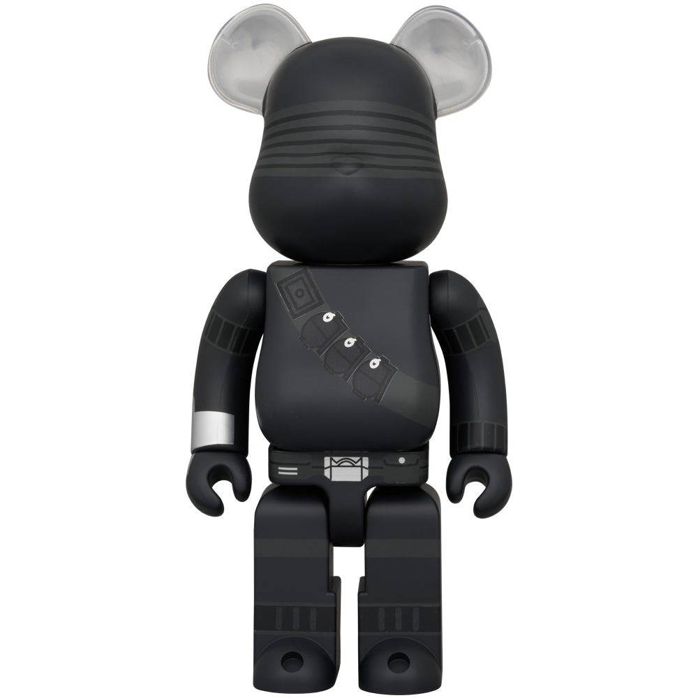 Black Bearbrick figure with stealth-style armor and silver accents, front view.