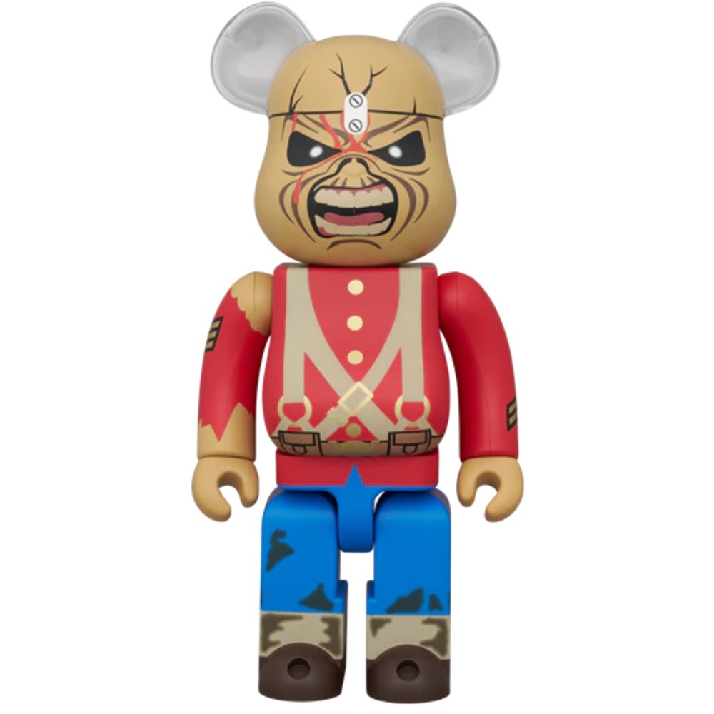 Bearbrick styled as Iron Maiden’s “The Trooper,” with battle-worn face, red coat, and blue pants.