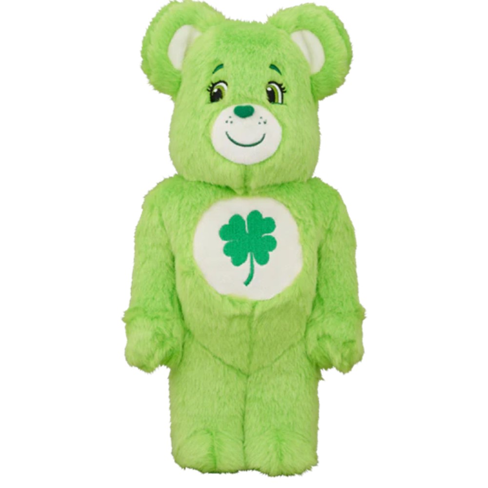 Green Good Luck Bearbrick costume figure with a clover symbol on its belly.