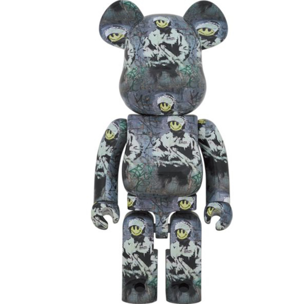bearbrick with a print of riot cop on it