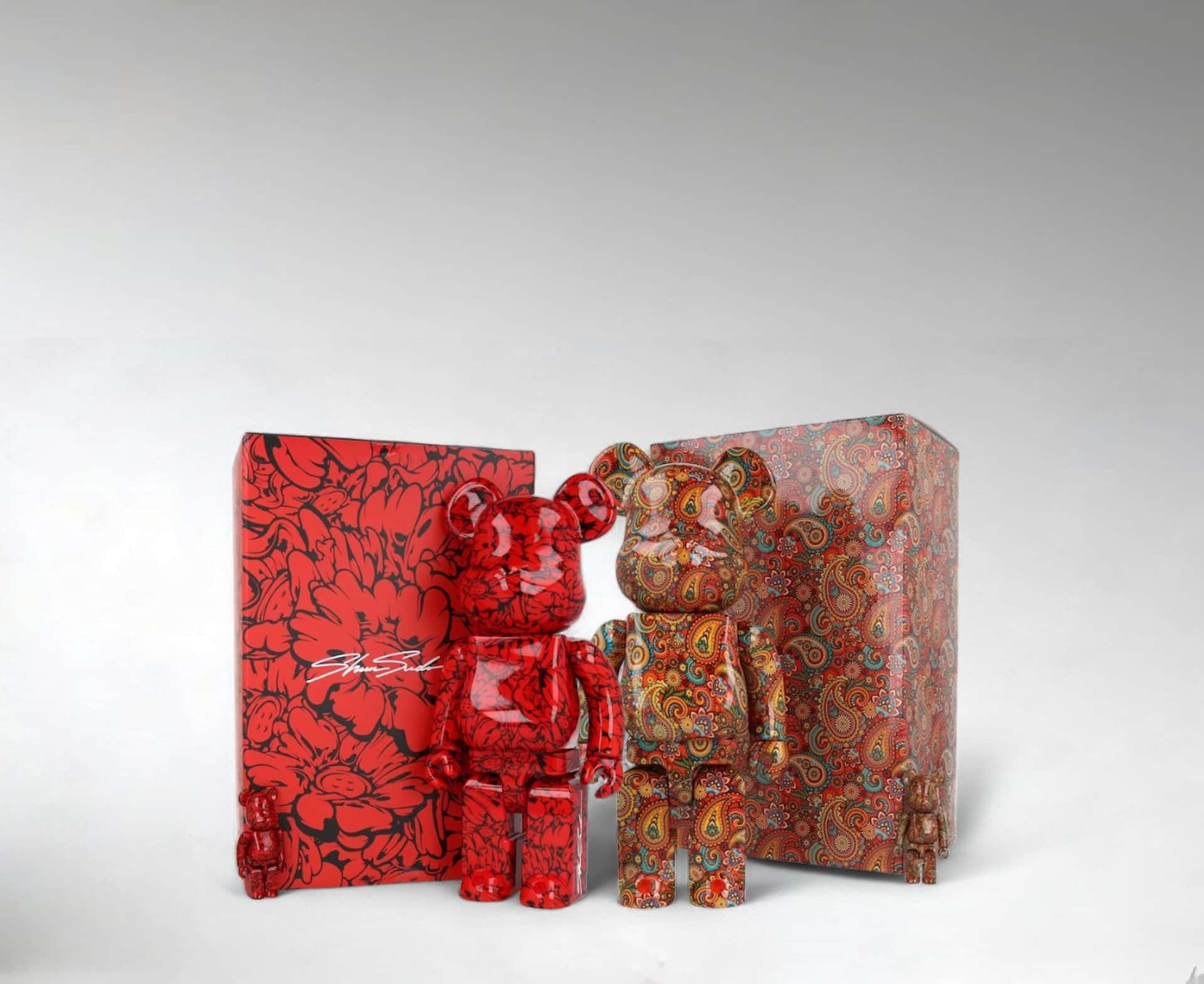 COLECTIKA - Authentic Designer Collectible Store Two products Bearbricks with packages stand on white floor